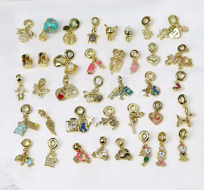 82560756 Dijes tipo pandora en oro laminado 18k (3 capas)