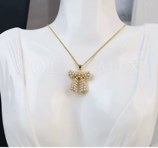 05546228 Conjunto lazos acentuados con perlas en oro laminado 18k (3 Capas)