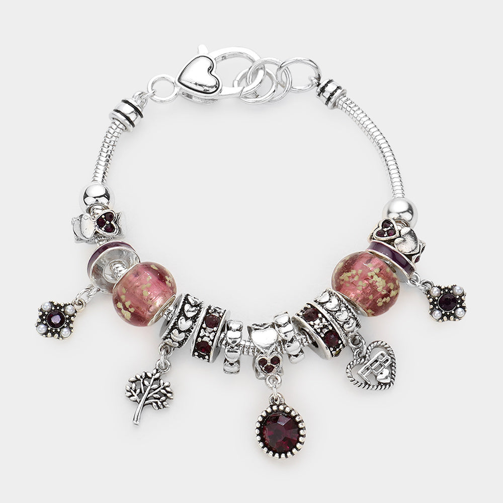Meses - Pulsera con múltiples charms y dije de corazón con piedra natal