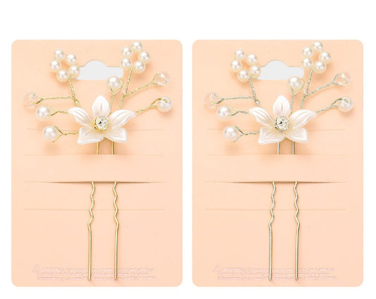 Horquillas para el pelo con flores puntiagudas y perlas