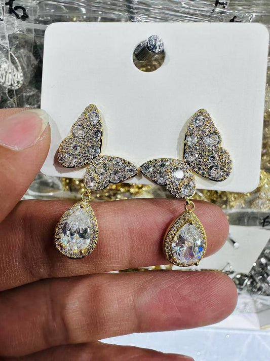 90335988 Aretes Mariposas con piedra lagrima en oro laminado 18k (3 Capas)